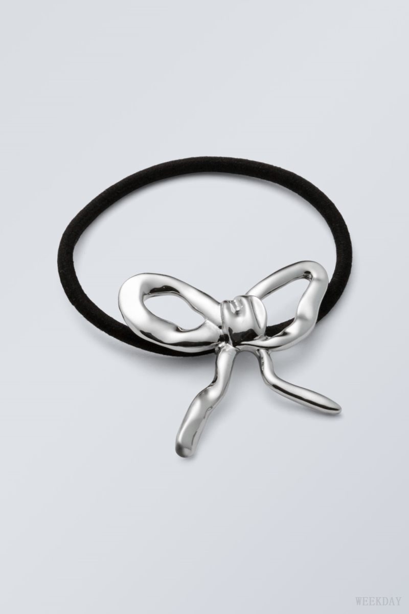 Weekday Metal Bow Hair Elastic Silver | SWXR4041